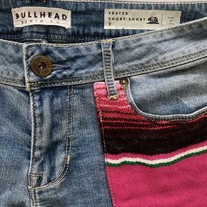 Shorts with patched pockets